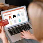 Image of a woman entering her credit card information on an online shop