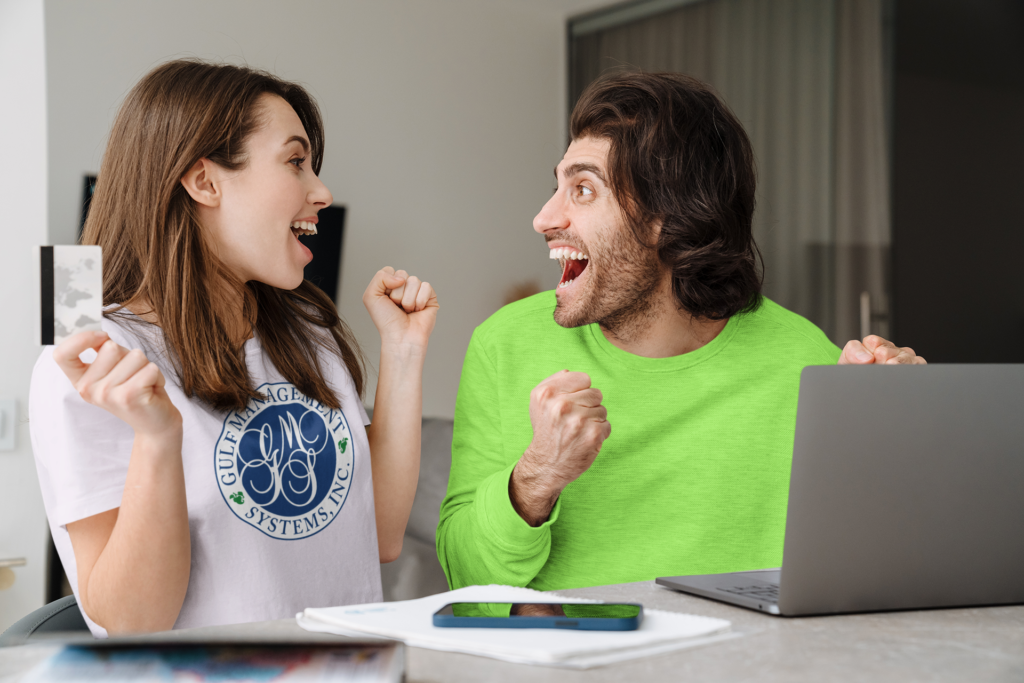 Image of clients on computer happy about how GMS software accepts different types of payments