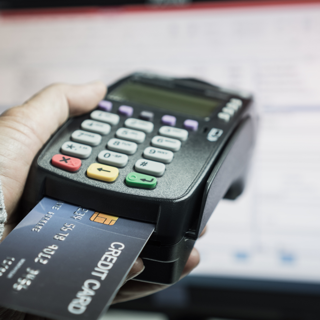 Image of pos system features with a credit card